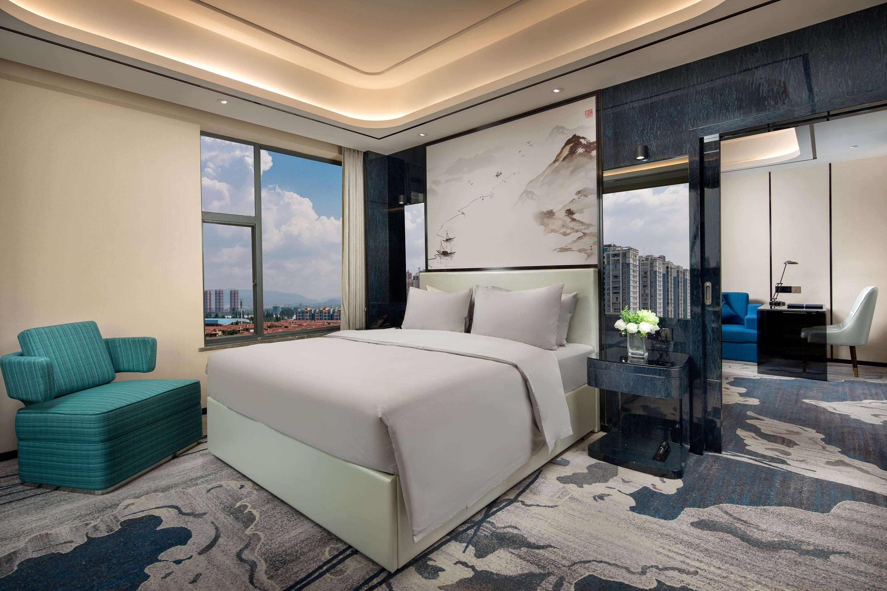 Ramada By Wyndham Mengzi Suites Экстерьер фото