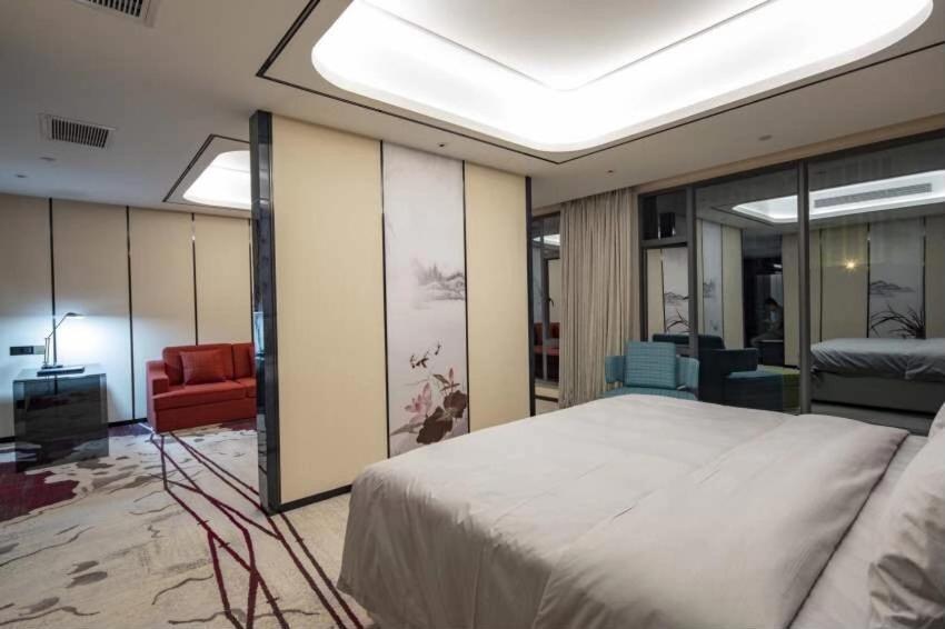 Ramada By Wyndham Mengzi Suites Экстерьер фото